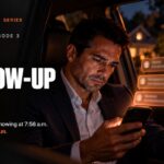 Realtor in his car at night reading three unanswered messages from a buyer